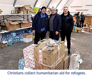 Christians collect humanitarian aid for refugees.